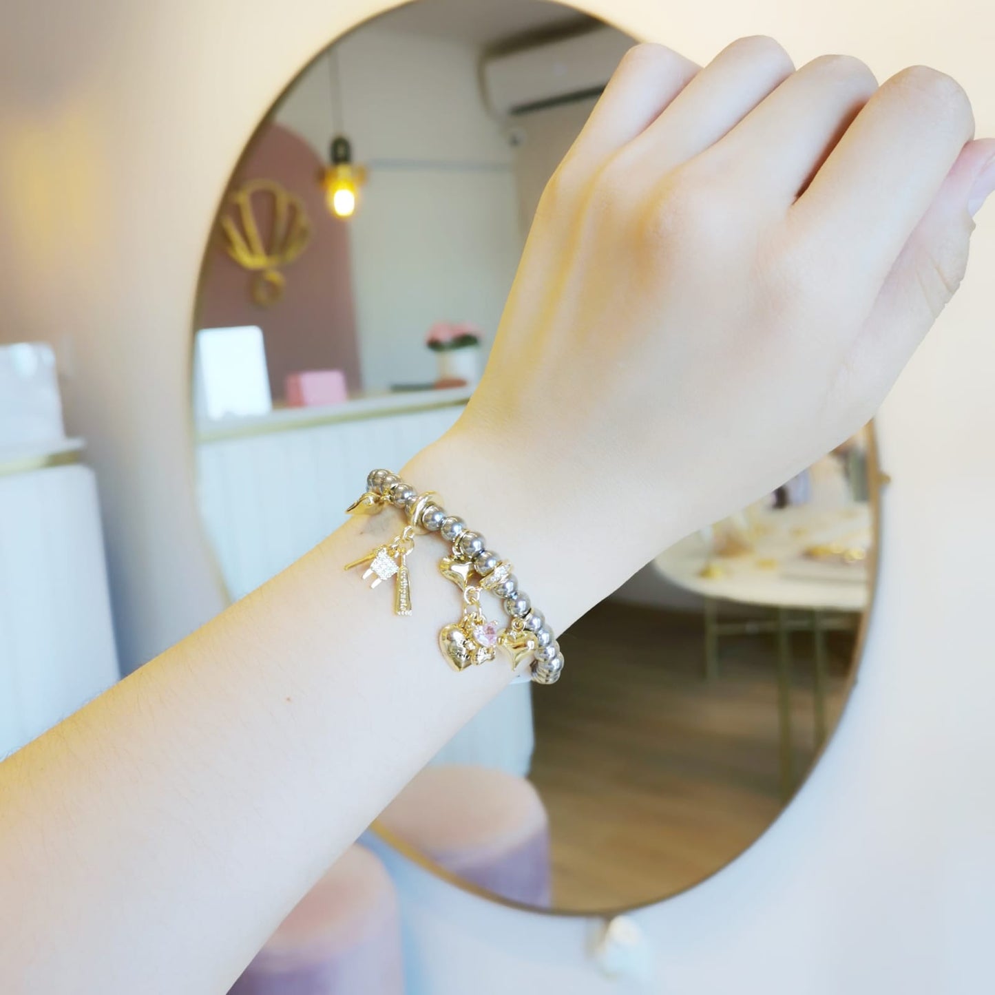PULSERA DENTISTA PLATEADA C/DIJES