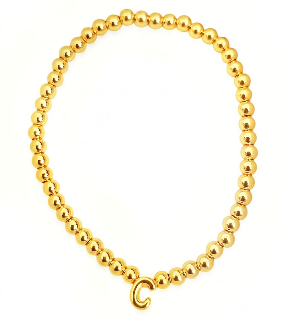 PULSERA INICIAL DORADA