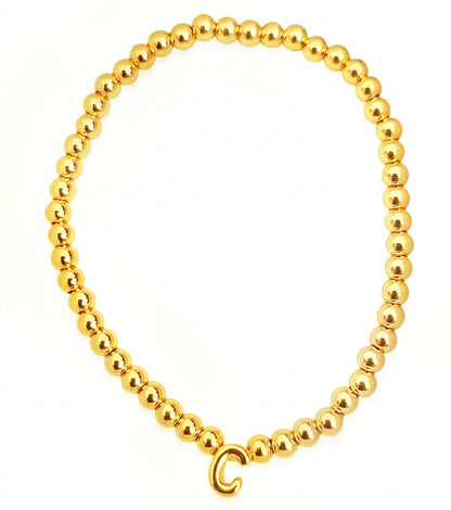 PULSERA INICIAL DORADA