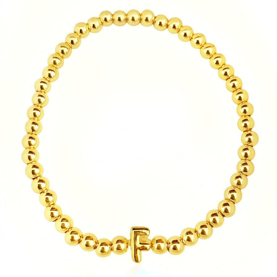 PULSERA INICIAL DORADA