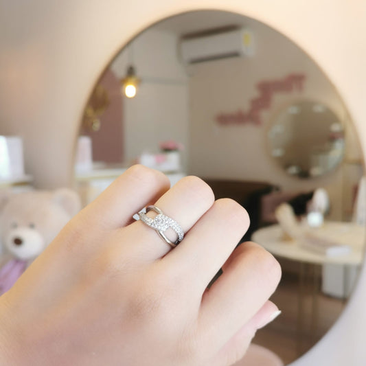 ANILLO CRUZADO PLATEADO