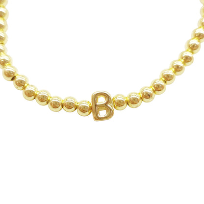 PULSERA INICIAL DORADA