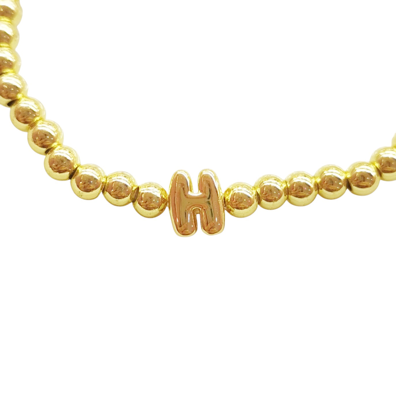 PULSERA INICIAL DORADA