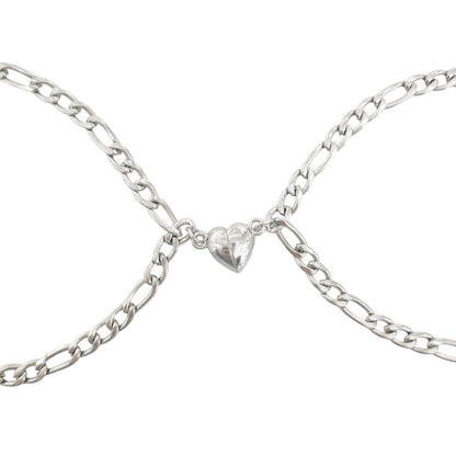 PULSERA CON CORAZONES MAGENTICOS PLATEADA