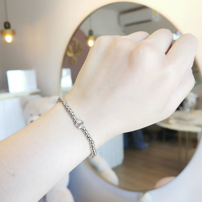 PULSERA INICIAL PLATEADA