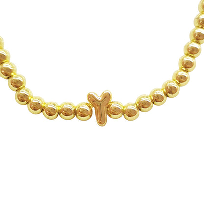 PULSERA INICIAL DORADA